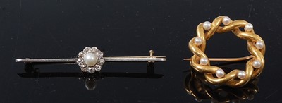 Lot 2572 - Two yellow metal brooches, comprising a...