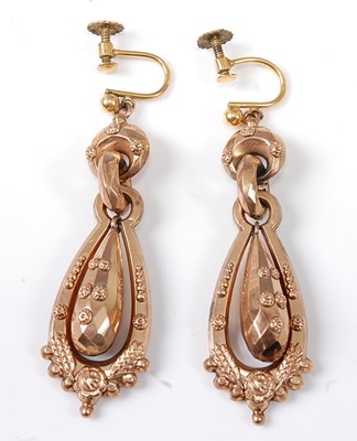 Lot 2573 - A pair of rose metal hollow articulated ear...
