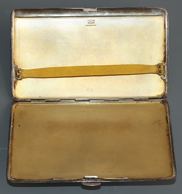 Lot 134 - A large Art Deco silver pocket cigarette case,...