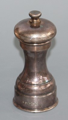 Lot 135 - A 1970s silver pepper mill, of plain turned...