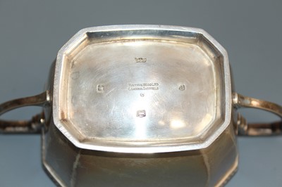 Lot 137 - A late Art Deco silver twin handled sugar bowl...