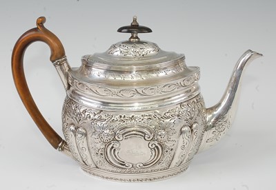 Lot 1152 - A George III silver teapot, of oval bombe form,...