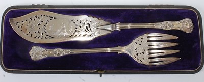 Lot 1156 - A cased pair of Victorian silver fish servers,...