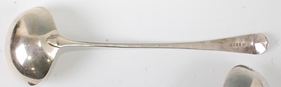 Lot 1158 - A George III silver soup ladle, in the Old...