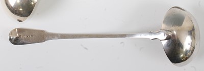 Lot 1159 - A George III silver soup ladle, in the Fiddle...