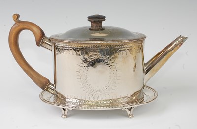 Lot 1160 - A George III silver teapot on stand, of beaded...