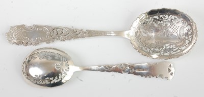 Lot 1167 - A late Victorian silver serving spoon together...