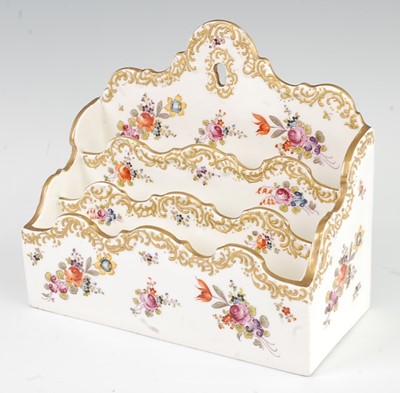 Lot 1088 - A 19th century porcelain letter-rack, having...
