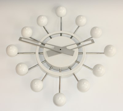 Lot 167 - An Atomic Design wall clock, white painted and...