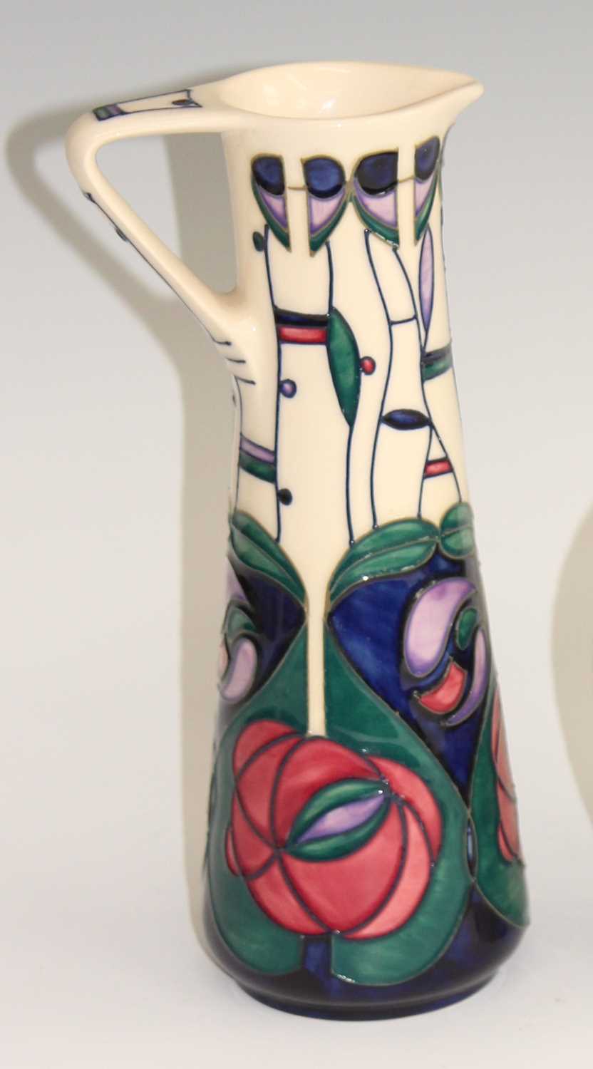 Lot 16 - A contemporary Moorcroft pottery ewer, in the...