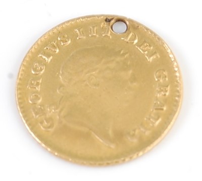 Lot 2072 - A gold 1/3 guinea, George III laureate bust,...
