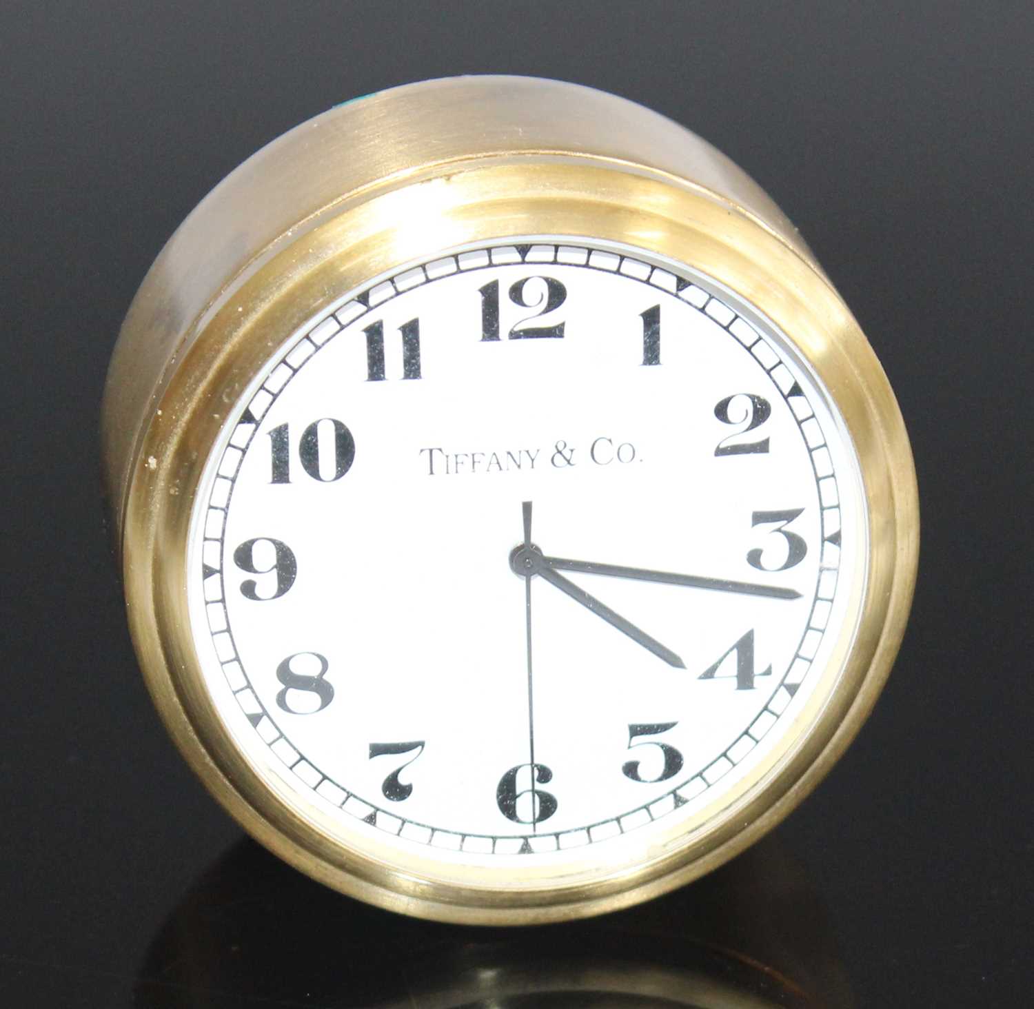 Lot 164 - Tiffany & Co - a small gilt brushed metal...