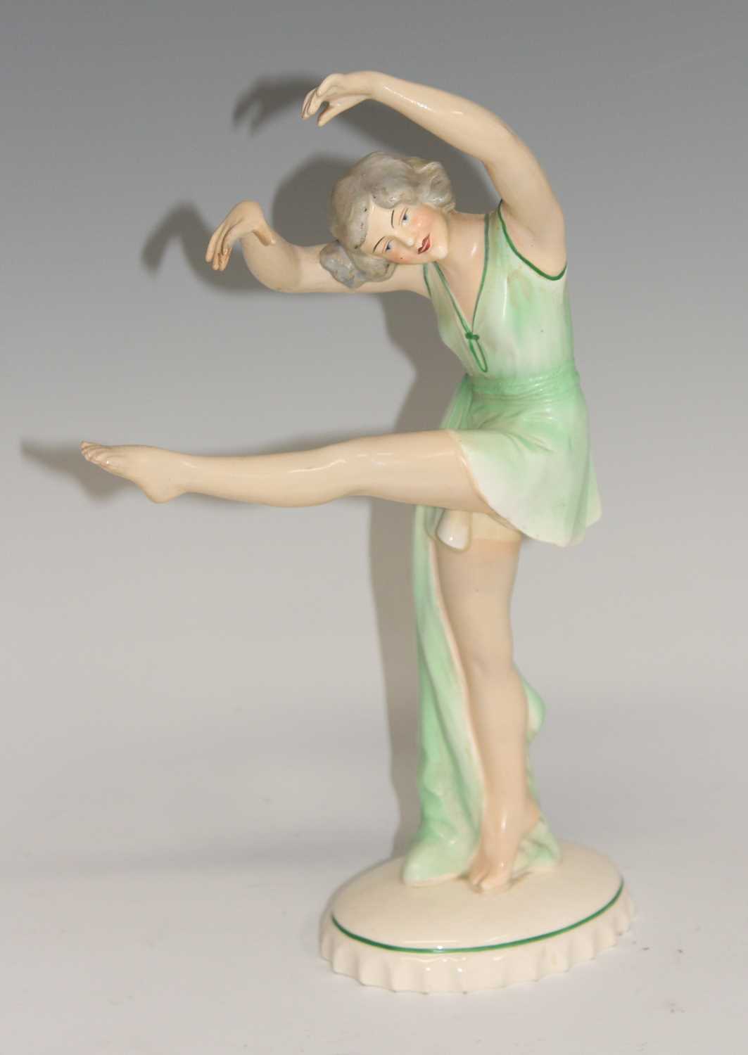 Lot 33 - In the style of Lenci - a 1930s ceramic figure...