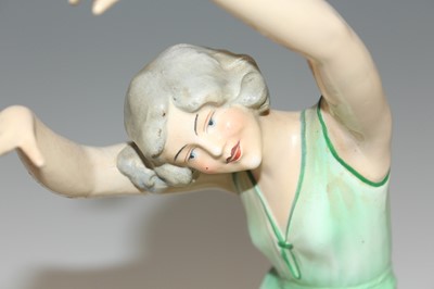 Lot 33 - In the style of Lenci - a 1930s ceramic figure...