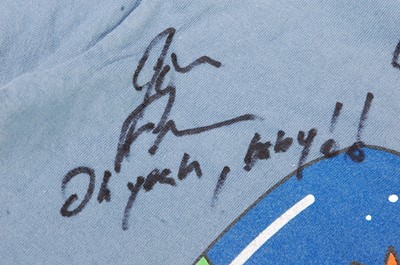 Lot 549 - A child's blue Futurama t-shirt, signed by...