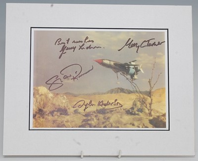 Lot 547 - Thunderbirds, a coloured print showing...