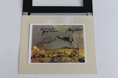 Lot 547 - Thunderbirds, a coloured print showing...