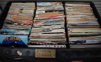 Lot 660 - A large collection of assorted 7" singles,...