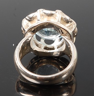 Lot 2574 - A white metal blue topaz single stone ring,...