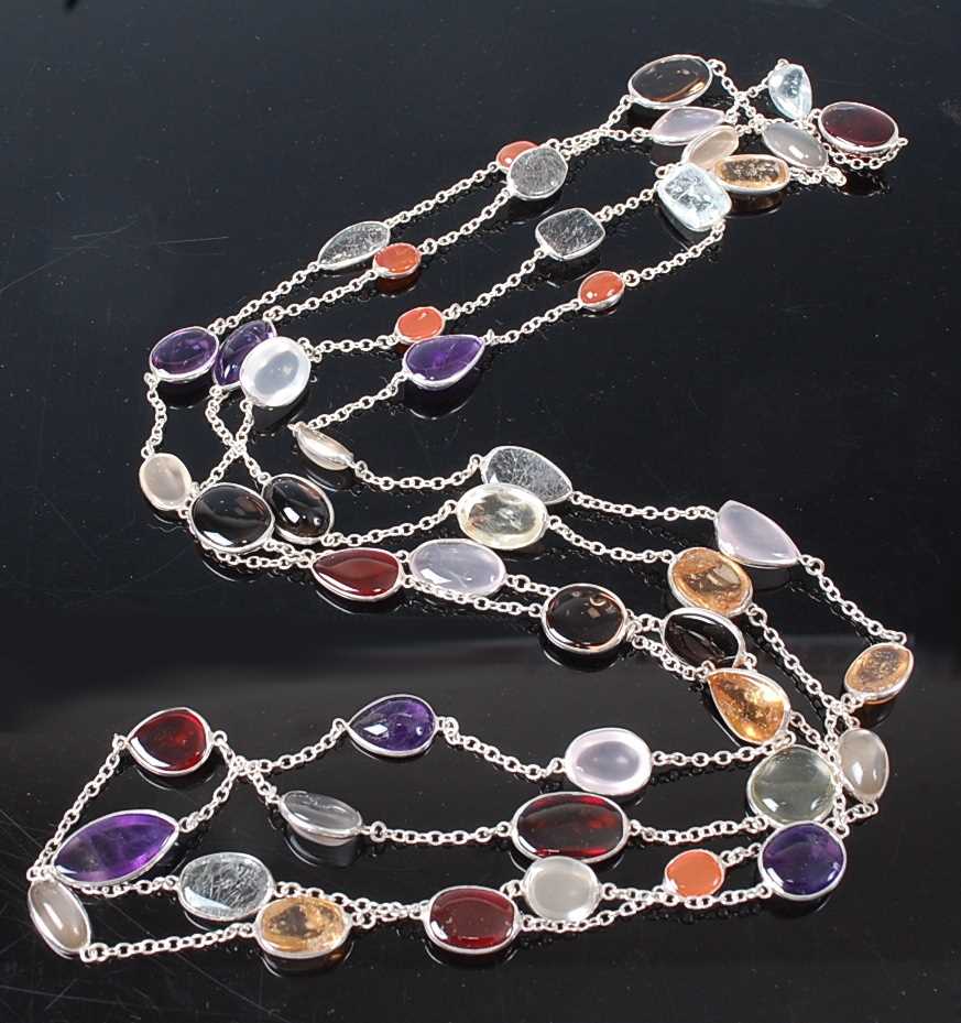 Lot 2613 - A white metal multi-stone long necklet, to...