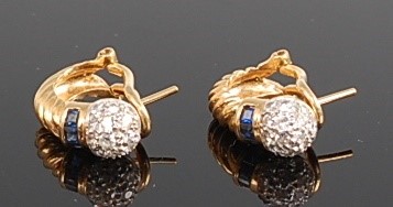 Lot 1187 - A pair of yellow metal, diamond and sapphire...