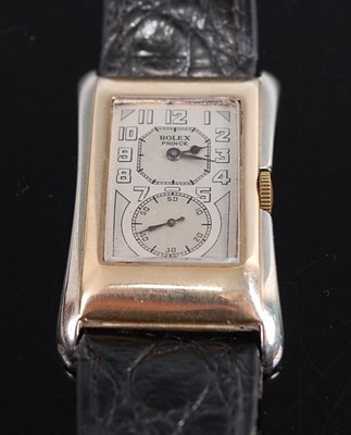 Lot 1239 - A vintage gent's 9ct yellow and white gold...
