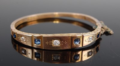 Lot 1205 - A late Victorian yellow metal, sapphire and...
