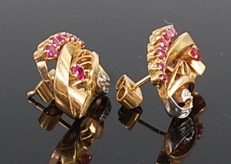 Lot 1186 - A pair of contemporary yellow metal, ruby and...