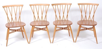 Lot 405 - A set of four 1960s Ercol light elm...