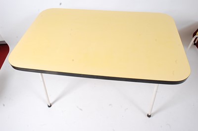 Lot 341 - A 1950s kitchen table and chairs by Bourne...