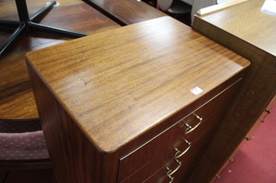 Lot 347 - A 1950s mahogany round cornered chest, of six...