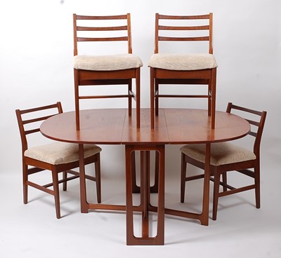 Lot 384 - A 1960s teak dining suite, comprising;...