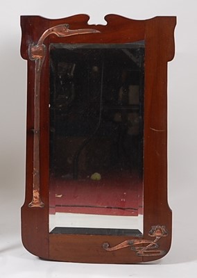 Lot 337 - An Art Nouveau mahogany framed and copper...