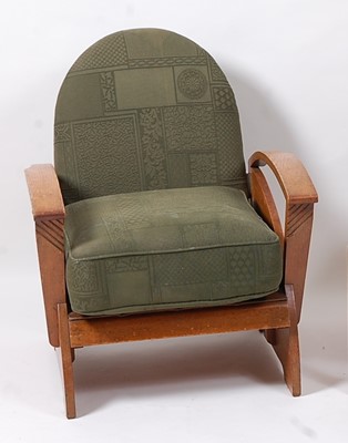 Lot 339 - An Art Deco oak elbow chair, having green...