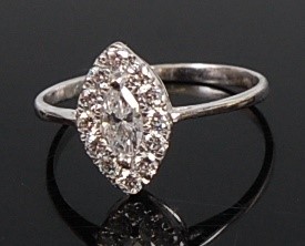 Lot 1210 - A white metal diamond navette shape cluster...