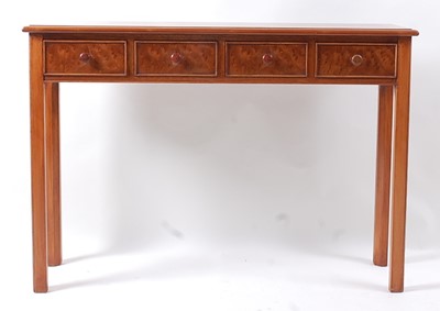 Lot 1408 - A figured walnut and crossbanded four drawer...