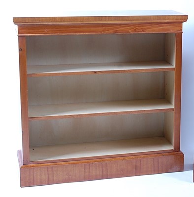 Lot 1410 - A walnut and figured walnut open bookcase,...