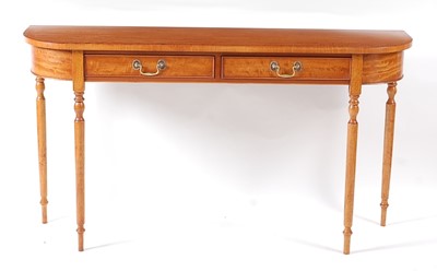 Lot 1443 - A satinwood D-end two drawer hall table, in...