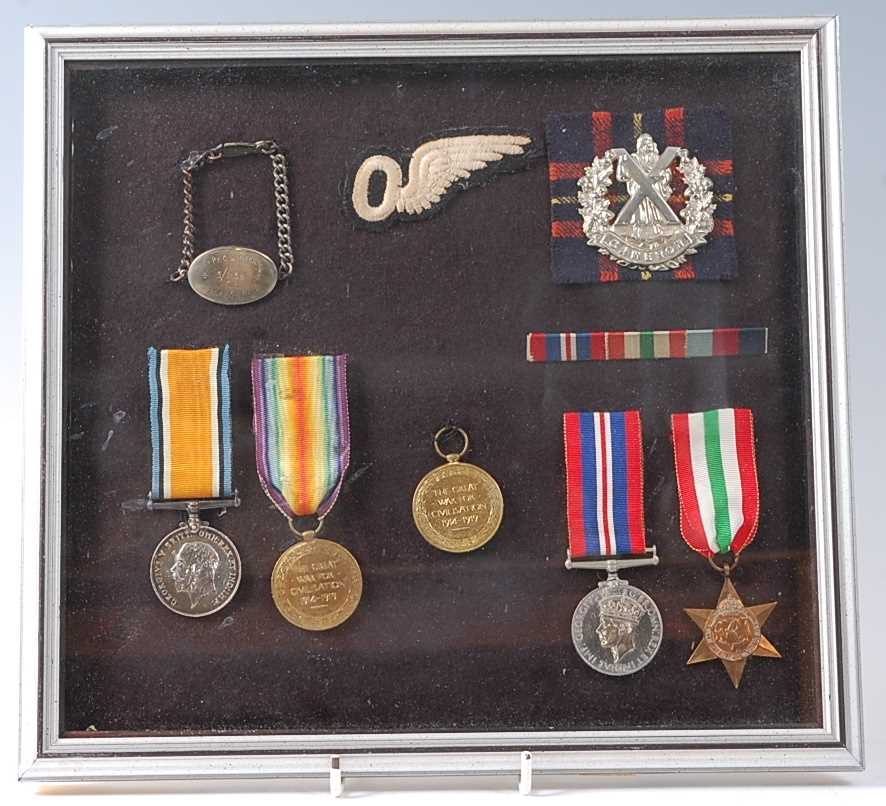 Lot 2123 - A group of medals to include WW I British War...