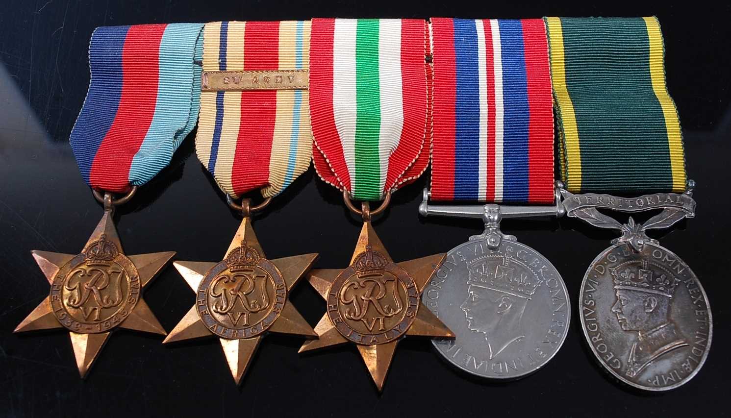 Lot 2124 - A WW II group of five medals to include...