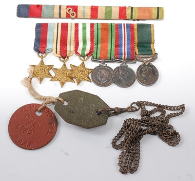 Lot 2127 - A miniature group of medals to include...