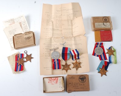 Lot 2128 - A collection of WW II medals to include...