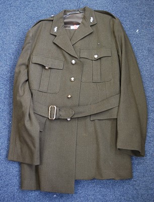 Lot 2472 - A large collection of post WW II uniforms and...