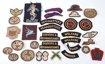 Lot 2368 - A collection of assorted cloth shoulder titles...