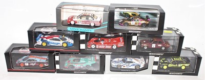 Lot 2345 - A group of 9 Minichamps boxed race cars to...