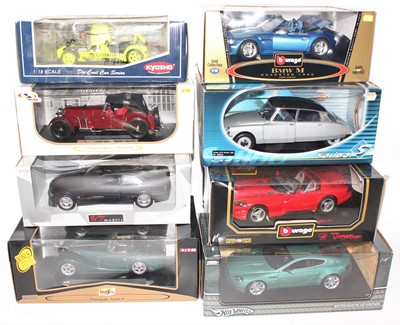 Lot 2352 - A group of 8 mixed 1:18 scale cars by various...