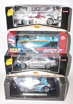 Lot 2358 - A group of 4x 1:18 scale Race cars as follows:...