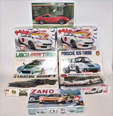 Lot 1057 - Eight various boxed as issued plastic racing...