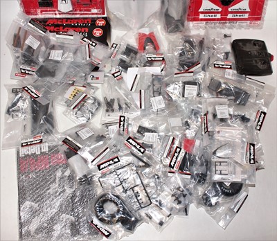 Lot 1064 - A large quantity of sealed Kyosho 1/8 scale...