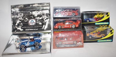 Lot 852 - Six various boxed or plastic cased slot cars...